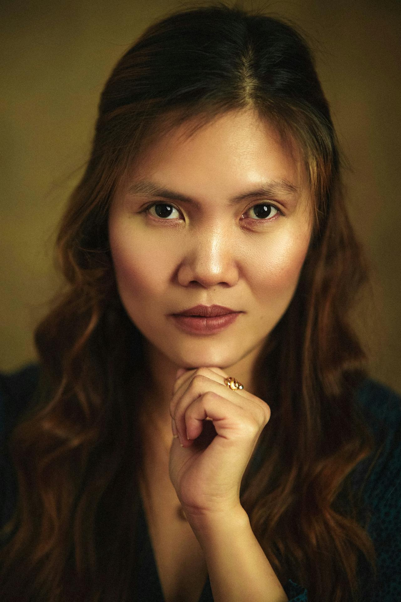 Candid moment captured in warm stage light at a corporate conference