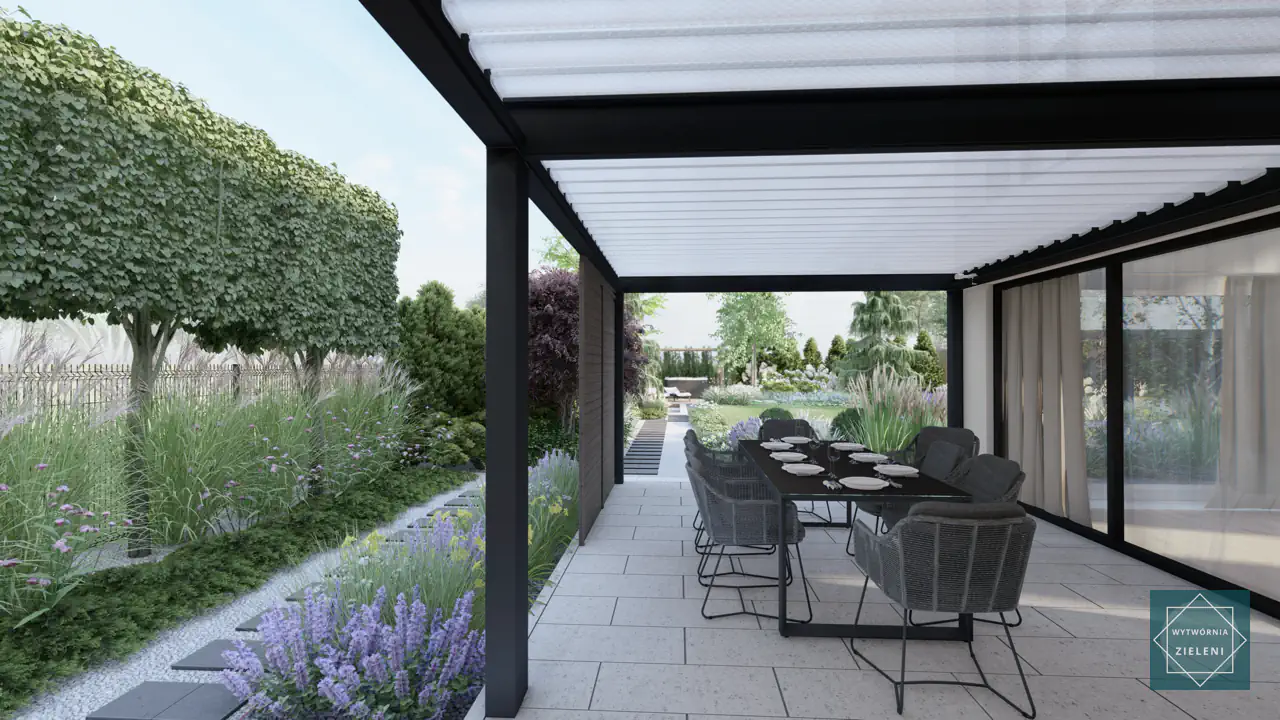 Ornamental grasses planted beneath formally pruned trees creating sophisticated contemporary landscape composition